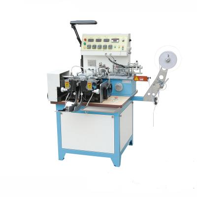 China Multifunction Woven Label Cut and Fold Machine JZ2817/ Garment Wash Care Satin Ribbon Label Cutting Machine Price for sale