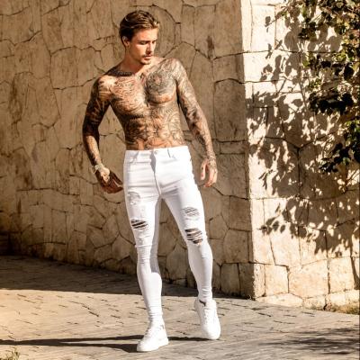 China Breathable Washed Men's Tight-Fitting Jeans Knee Holes Spring And Summer Slim Men's Pants for sale