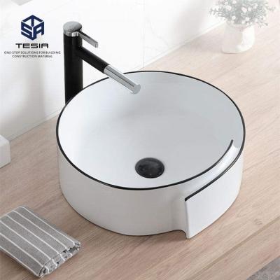 China Modern Bathroom  Ceramic Gold Black Wash Basin Countertop Sanitary Ware for sale