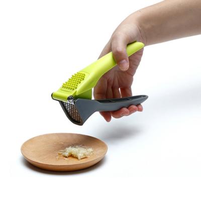 China New Design Wishome Garlic Tools Kitchen Tools Viable Accessories Stainless Steel Ginger Crusher Garlic Press for sale