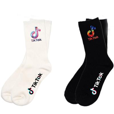 China QUICK DRY custom fashion men's fashion tik tok cotton hip hop socks crew socks in stock for sale