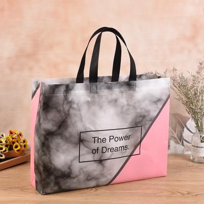 China Folding Color Laminated PLA Nonwoven Folding Bag Apparel Gift Shopping Packaging Bag Nonwoven Spot Advertising Bag for sale