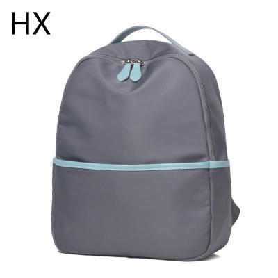 China 2022 Fashion Gray Outdoor Decoration PU School Girls Laptop Backpack Waterproof Bags For Female for sale