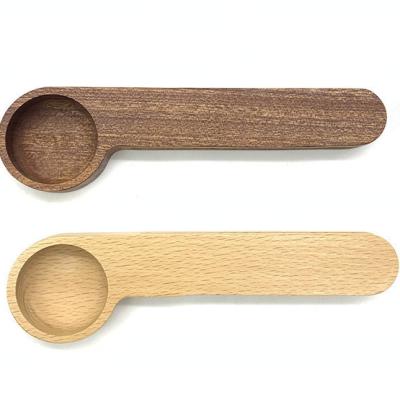 China Sustainable Wholesale Black Walnut Coffee Tea Measuring Sealing Staple Wooden Coffee Scoop With Clip for sale