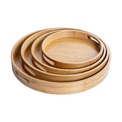 China Custom Wholesale Wooden Kitchen Serving Trays Kitchen Round Bamboo Serving Tray With Handles for sale