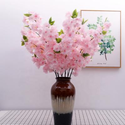 China Beautiful 4 Dense Pink Cherry Blossom Branches Artificial Flower Silk Flowers Branch With Leaf For Sale for sale