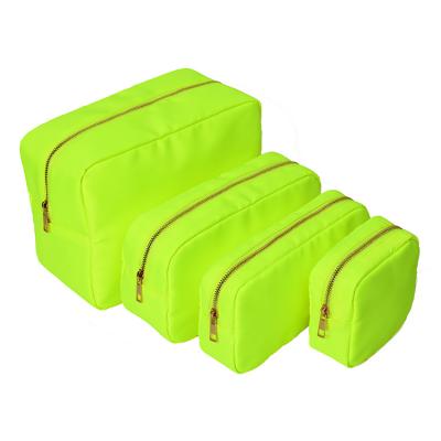 China Fashion New Stock Neon Green Nylon Large Capacity Travel Wash Bag Set Personalized DIY Patches Logo Cosmetic Pouch for sale