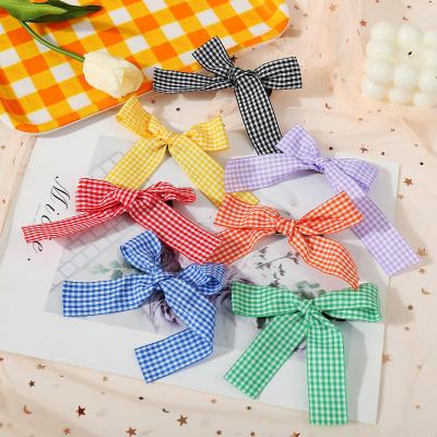 China Sweet Girls School Candy Color Plaid Kids Hairpins Cute Bowknot Hair Accessories Hangs Hair Clip for sale