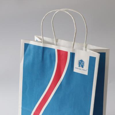 China Brand Logo Luxury Boutique Shopping White Recyclable Customized Gift Paper Bags With Ribbon Handles for sale