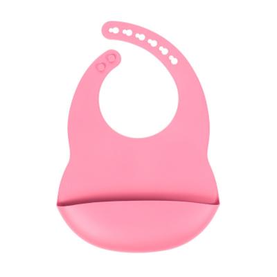 中国 Pink Colors Newborn Feeding Silicone Catch Bib With Pocket Custom With Size Is 3.5*30.6*20.8 cm And Weight Is 81 Gram 販売のため