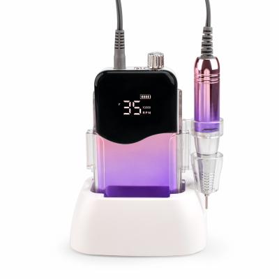 China Portable Rechargeable Electric Nail Drill Machine 2022 35000RPM Stainless Steel Magic Gradient With Filling Station Custom Private Logo for sale