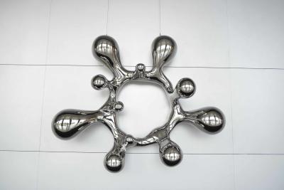 China Indoor Mirror Stainless Steel Sculpture Abstract Spray Water Metal Art Decoration for sale