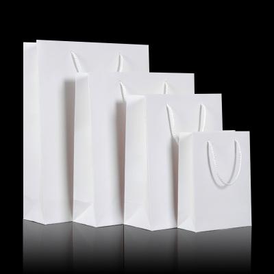 China Custom package logo handbag paper white card thickened gift bag white bag paper card private wrapping paper for sale