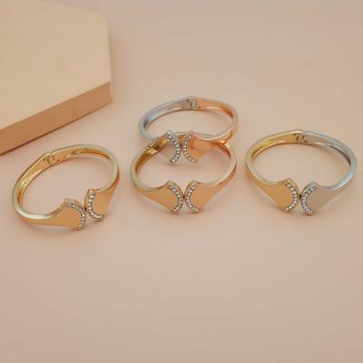 China FASHIONABLE Gold Plated Women's Bracelet Bangle Brazalete Women Shape Bracelets and Bangles Jewelry for sale