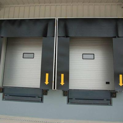 China High quality sound insulation logistics equipment automatic sectional overhead door with dock shelter and dock leveler for logistics system for sale