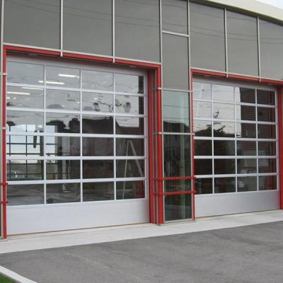 China High Quality Sound Insulation Electric Industrial Steel Vertical Sectional Sliding Doors With Whole Visual Glass Panels for sale