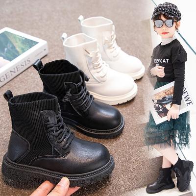 China Children's Martin Boots Autumn New Midi Anti-slippery rejects boy and girl's solid color lace up 4-16 years old Korean simple child boots for sale