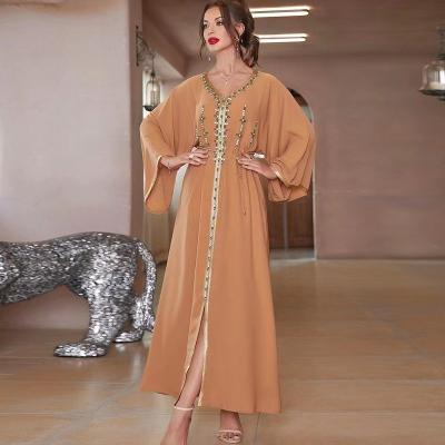 China Comfortable Feel Islam Dress For Plus Size Woman Hand Sewn Diamond Sheath Full Skirt V-Neck Long Dress Women Dubai Dress Middle East Dress for sale