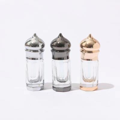 China Hot Selling Durable Fancy Glass Perfume Essence Oil Bottle Custom Made Mini Gold Mini Bottles With Alloy Cap for sale