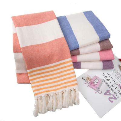 China Compressed Genuine Turkey 100% Cotton Beach Towel Hummam Fouta Turkish Towels With Tassels for sale