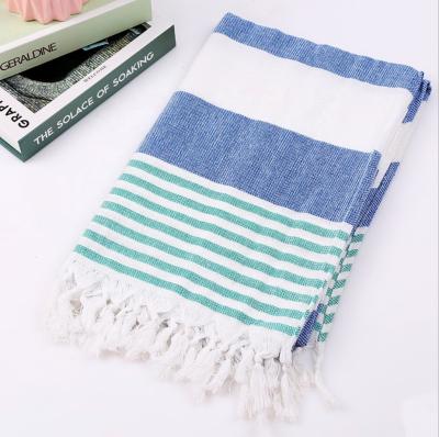 China Compressed Custom Cotton Turkish Fouta Beach Towels for sale