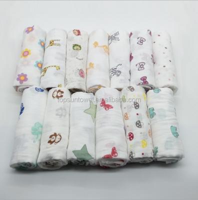 China Disposable Cheap Organic Cotton Muslin Fabric Printed Baby Wrap Covering for sale