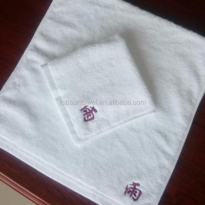 China Compressed Embroidery Custom Hotel White Face Towel for sale