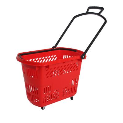 China Supermaerket Food Convenience Store Stackable Shopping Basket Customized Plastic Four Wheels 35L Trolley Basket for sale