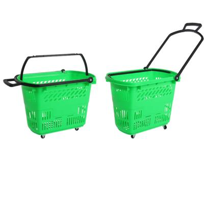 China Supermaerket Shopping Wheel Tie Rod Trolley Green Handheld Plastic Four Wheel Shopping Cart for sale