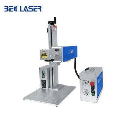 China Air Cooled Portable CO2 Laser Marking Machine For No-metal Coconut Wood Carving 3D Cutting for sale