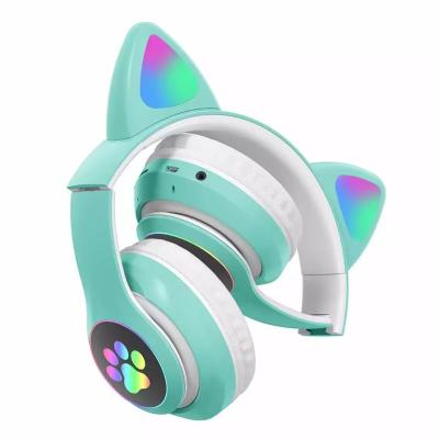 China Support TF Card Mini Wireless Blue Tooth Earphones Cat Headphones Kids Headphones Cartoon Online for sale