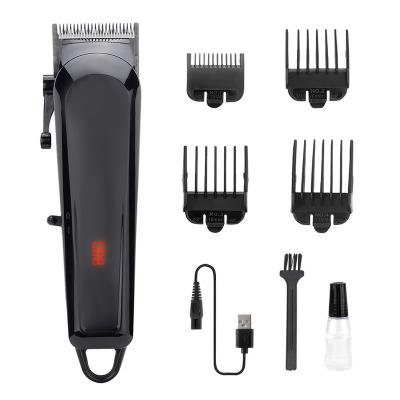 China Outdoor professional intelligent cordless LCD hair salon trimmer black rechargeable hair clipper for sale