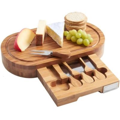 China Hot High Quality Oval Natural Bamboo Solid Wooden Slide Out Storage Box Drawer Cheese Board With Tool for sale