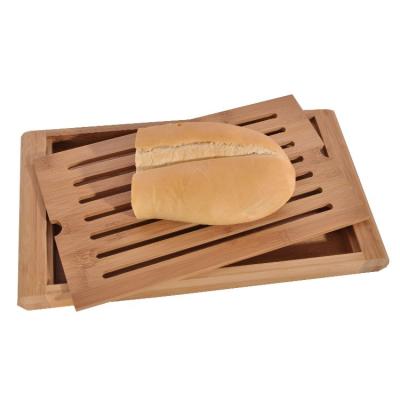 China Sustainable Bamboo Large Catcher Removable Bread Crumb Vegetable Cutting Board With Bread Crumb Tray for sale