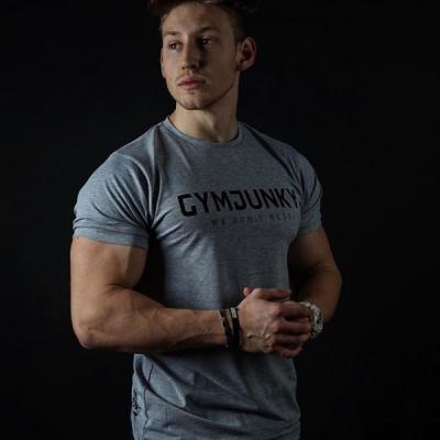 China New Muscle Sportswear Gyms Fitness Gyms T-shirt Breathable Anti-Wrinkle T-shirt Bodybuilding Men Tightly T-shirt for sale