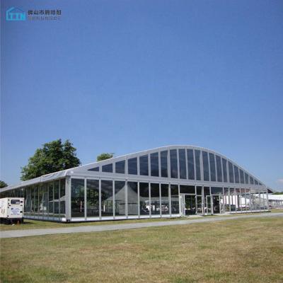 China UV-resistant/windproof/waterproof China manufacturer 15m large transparent arched curve tent for outdoor events for sale