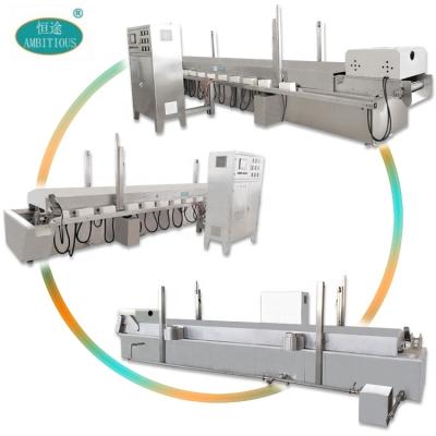 China Factory Automatic Oil Frying Machine Automatic Oil Immersed Pork Skin Frying Line 200~300kg/hr Touch Screen Optional 0-300°C 550L for sale