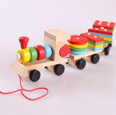 China Construction toy fq brand hot sale funny baby safety build assorted shape trail blocks wooden train for sale