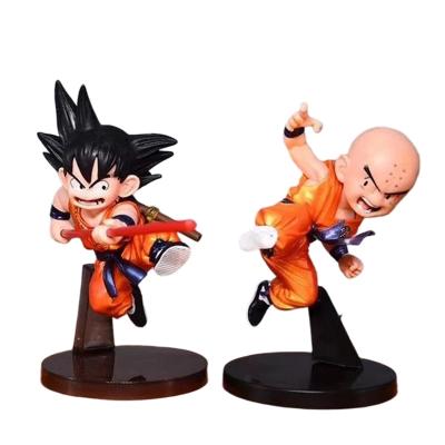 China Cartoon Toy 2 Styles 10CM Dragon Anime Statue Battle Hand Model Animation Toys For Children Doll Gift Son Goku Kuririn Action Figure for sale