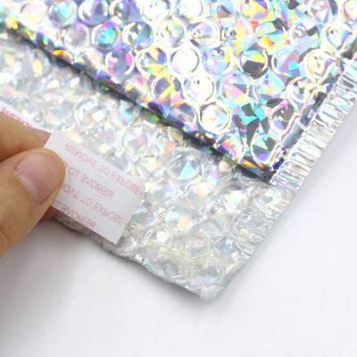 China Poly Bubble Mailers 6x10 Inch Shockproof Waterproof Holographic Padded Bubble Mailers Poly Bubble Mailer With Logo Poly Mailer Mailer Bubble for sale