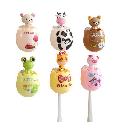 China Cute Animal Children's Double Suction Wall Mounted Creative Automatic Cup Cartoon Toothbrush Egg Shaped Holder for sale