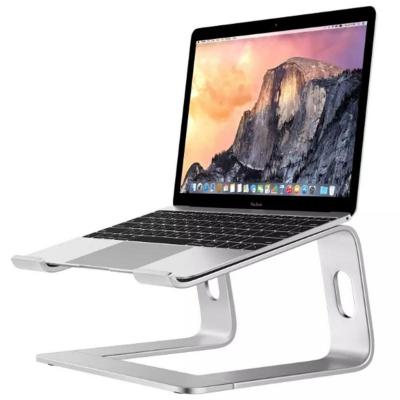 China 360 Degree Rotating Wholesale Children's Notebook Universal Foldable Laptop Stand Cooling Lazy Desk Stand for sale