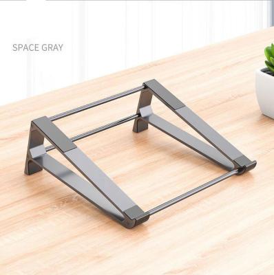 China Metal Aluminum Alloy Wholesale Desktop Notebook Stand Laptop Cooling Stand for sale