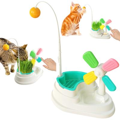 China Viable Factory Wholesale Popular Cat Toys Tease Cat Grass Stick Fight Cat Ball Windmill New for sale