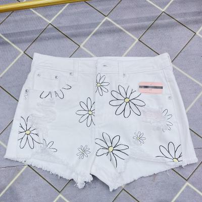 China QUICK DRY sexy hot shorts for women back high quality raw cute vintage denim edge pocket flower flower summer clothing short pants wholesale for sale