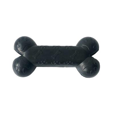 China Stocked Black Bone Pet Toys Food Puzzle Natural Rubber Dog Bone Toy for sale