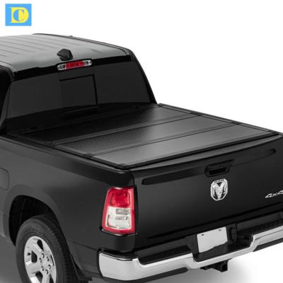 China Hot Selling Hard Triple Aluminum Tonneau Cover for Tacoma Tundra Hilux for sale