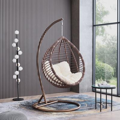 China Modern Outdoor Beach Vacation Seaside Vacation Wicker Rattan Furniture Basket Swing Chair Patio Swing Cane Hanging Rocking Chair for sale