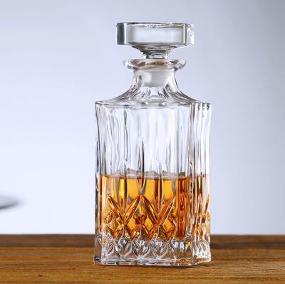 China Empty Round Empty Vodka Whiskey Liquor Glass Beverage Vodka Bottle Glass Rum Bottles 750ml With Top Cork Cap for sale