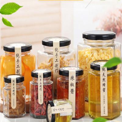 China Transparent Nut Sugar Canister Tank Honey Storage Bottle Empty Jar Freshness Preservation Hexagon Glass Bottle for sale